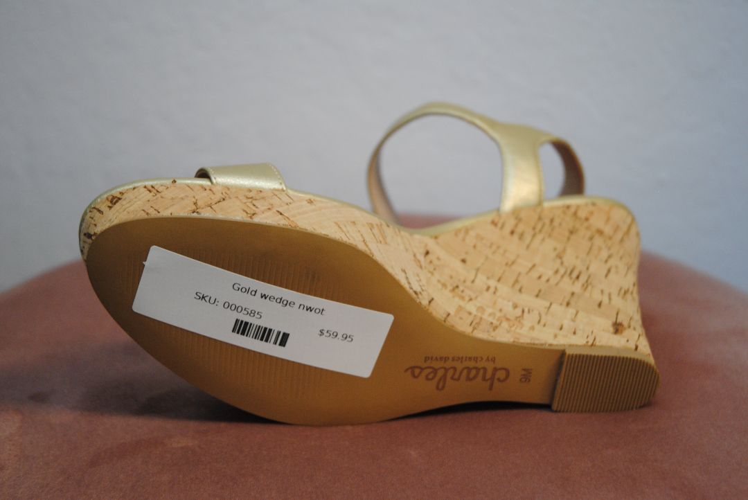Charles by Charles David gold wedges displayed – NWOT, size 9