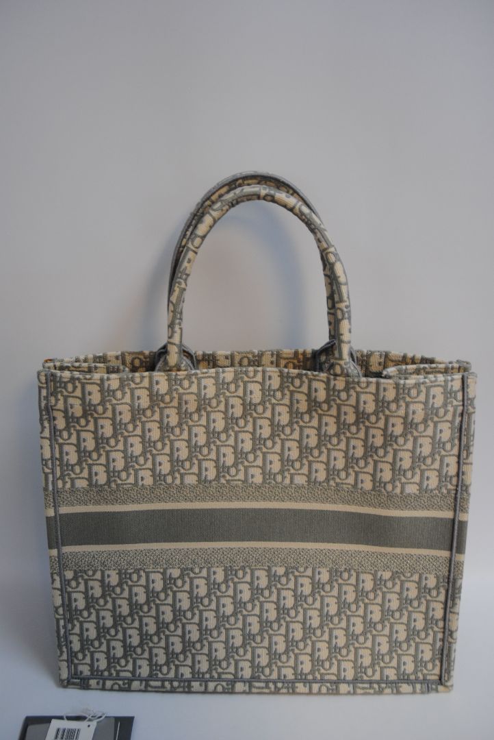 Blue Christian Dior Book Tote in Blue Oblique Embroidery โ Large Size, Length: 16.5 in (42 cm) Height: 14 in (35.5 cm) Depth: 7 in (18 cm) Handle Drop: 6.5 in