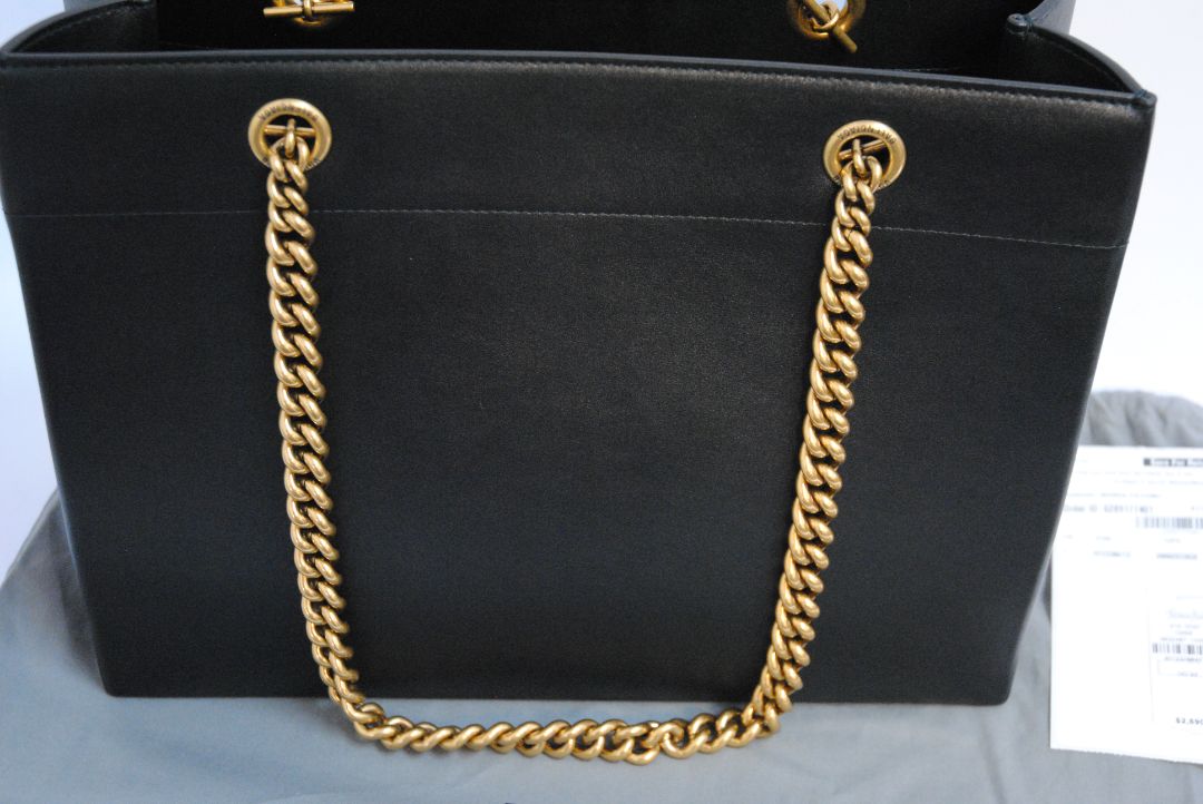 Black Balenciaga Medium Shopping Tote in Black Calfskin Leather with Aged Gold Chain, Length: 13.8 in (35 cm) Height: 11.8 in (30 cm) Depth: 5.5 in (14 cm) Strap Drop: 11 in