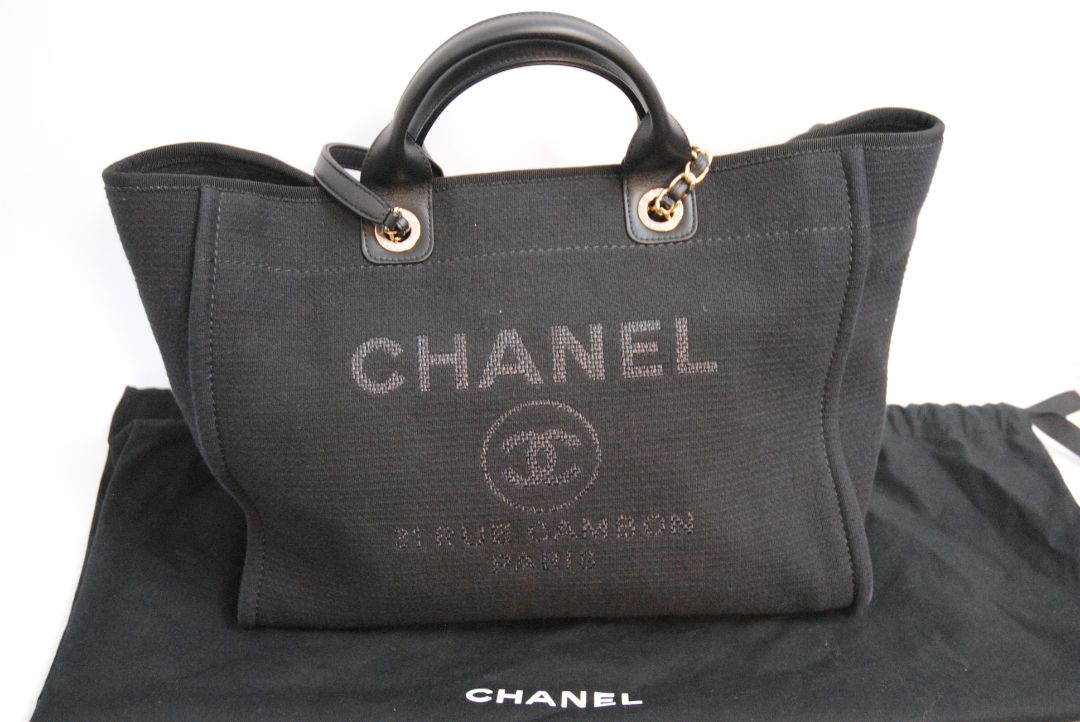 black Chanel Deauville Large Shopping Tote in Black Canvas with Leather Trim:, Length: 15 in (38 cm) Height: 11.5 in (29 cm) Depth: 6 in (15 cm) Handle Drop (top handles): 4.5 in Strap Drop (shoulder chains): 10 in