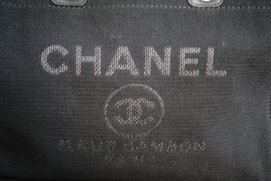 black Chanel Deauville Large Shopping Tote in Black Canvas with Leather Trim:, Length: 15 in (38 cm) Height: 11.5 in (29 cm) Depth: 6 in (15 cm) Handle Drop (top handles): 4.5 in Strap Drop (shoulder chains): 10 in