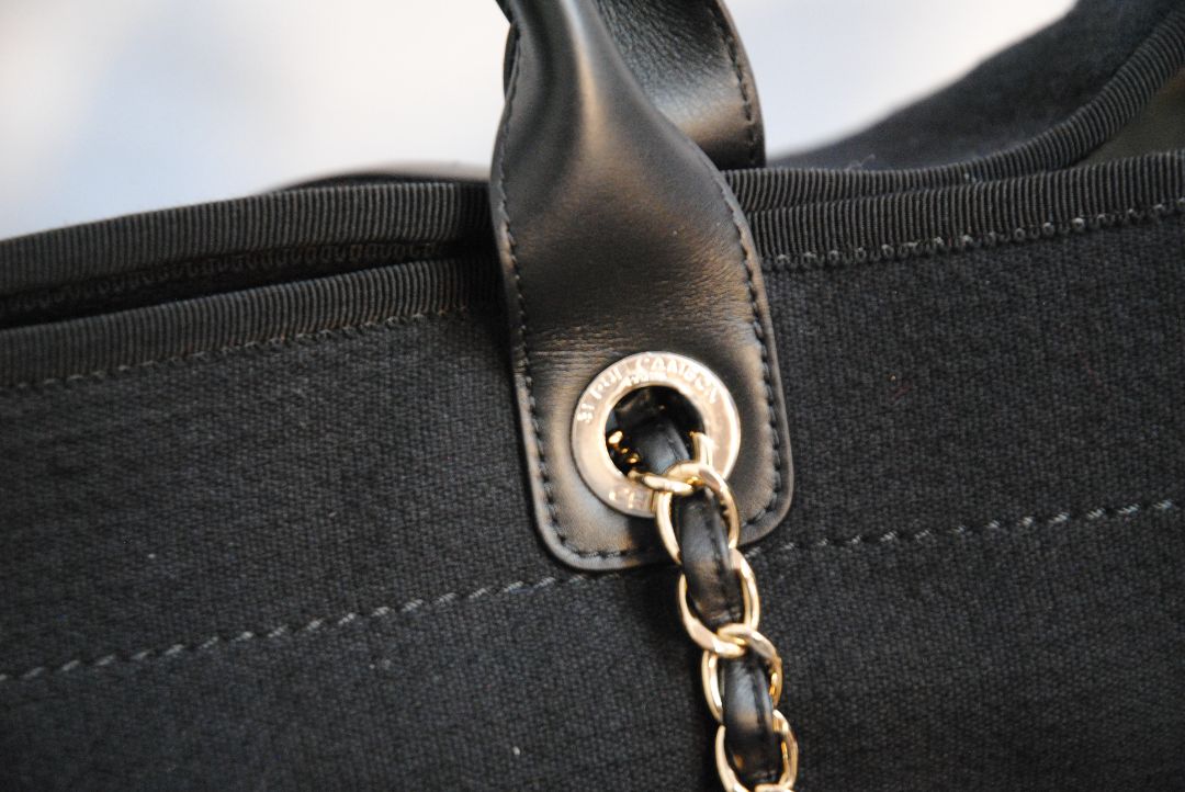 black Chanel Deauville Large Shopping Tote in Black Canvas with Leather Trim:, Length: 15 in (38 cm) Height: 11.5 in (29 cm) Depth: 6 in (15 cm) Handle Drop (top handles): 4.5 in Strap Drop (shoulder chains): 10 in