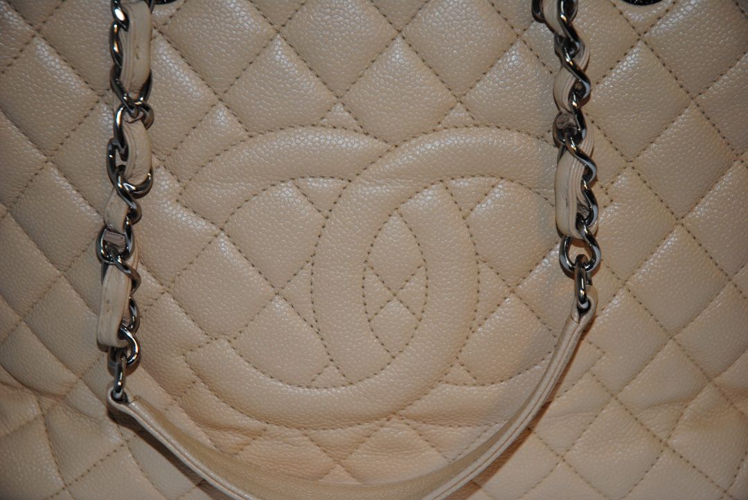 Beige Caviar Chanel Grand Shopping Tote (GST) in Caviar Leather with silver-tone, Length: 13.5 in Height: 10 in Depth: 5 in Handle Drop: 9 in