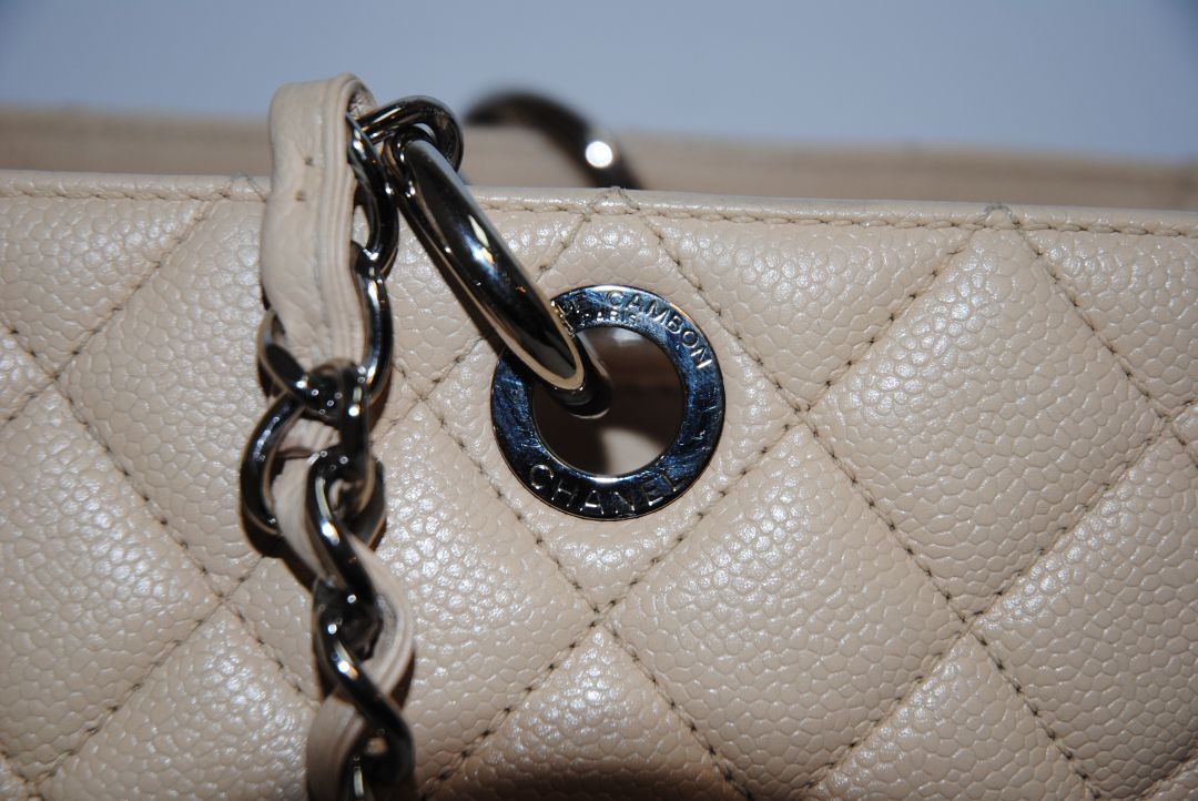 Beige Caviar Chanel Grand Shopping Tote (GST) in Caviar Leather with silver-tone, Length: 13.5 in Height: 10 in Depth: 5 in Handle Drop: 9 in