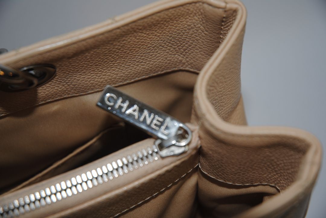 Beige Caviar Chanel Grand Shopping Tote (GST) in Caviar Leather with silver-tone, Length: 13.5 in Height: 10 in Depth: 5 in Handle Drop: 9 in