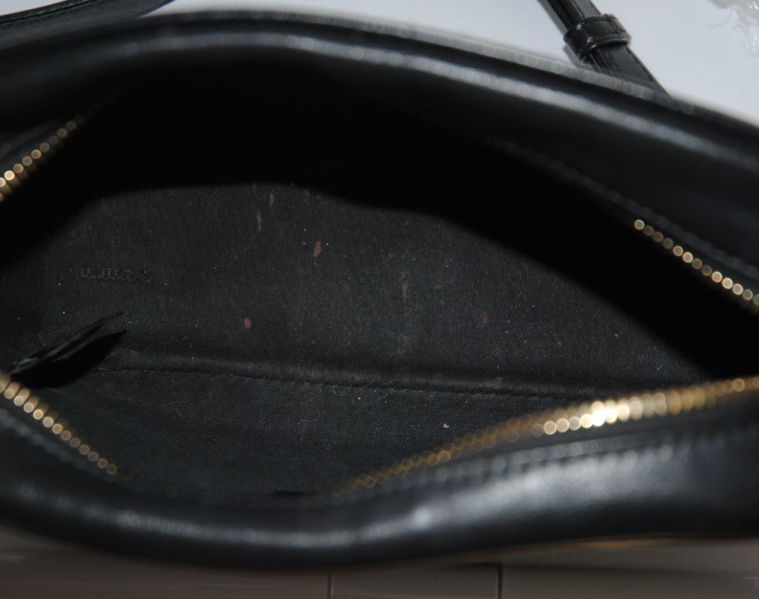 : Brown Zucca monogram Fendi rare Vintage Zucca Crossbody Camera Bag – Brown Canvas with Black Leather Trim, Length: 8.5 in (21.5 cm) Height: 6 in (15 cm) Depth: 2.5 in (6.5 cm) Strap Drop: 21–23 in (adjustable crossbody)