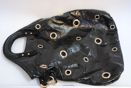 black Stella McCartney grommet patent eco tote, Length: 18 in (46 cm) Height: 16 in (41 cm) Depth: 5 in (13 cm) Top Handle Drop: 4 in Shoulder Strap Drop: Adjustable up to 20 in (Ideal for top-handle or crossbody wear)
