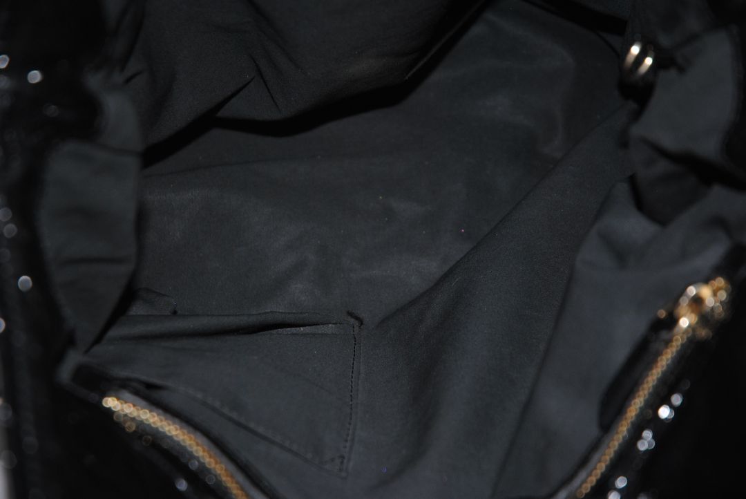 black Stella McCartney grommet patent eco tote, Length: 18 in (46 cm) Height: 16 in (41 cm) Depth: 5 in (13 cm) Top Handle Drop: 4 in Shoulder Strap Drop: Adjustable up to 20 in (Ideal for top-handle or crossbody wear)