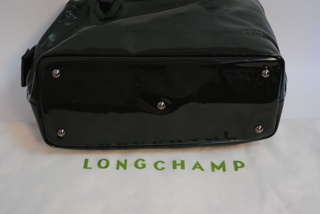 forest green Longchamp bowling bag, Length: 13 in Height: 9 in Depth: 6 in Handle Drop: 5 in Strap Drop (Adjustable/Removable): 17β21 in