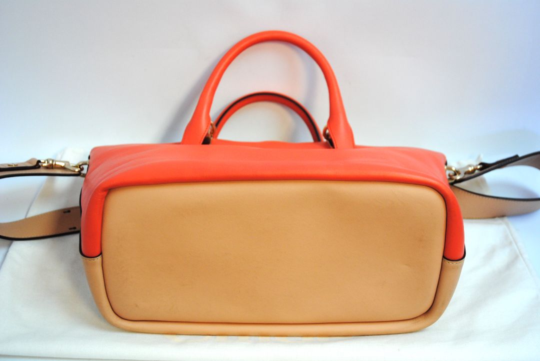 blush and coral Chloe colorblock leather tote, Length: 13.5 in Height: 9.5 in Depth: 6 in Handle Drop: 5 in Strap Drop: 17 in (adjustable, removable wide strap)