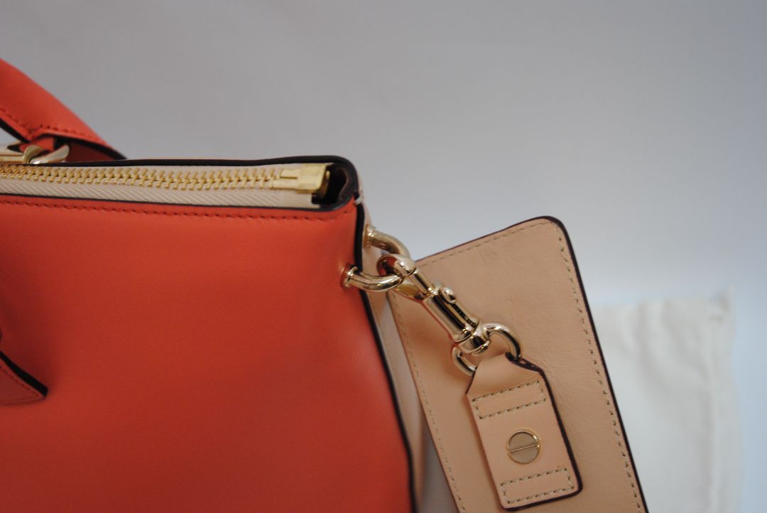 blush and coral Chloe colorblock leather tote, Length: 13.5 in Height: 9.5 in Depth: 6 in Handle Drop: 5 in Strap Drop: 17 in (adjustable, removable wide strap)