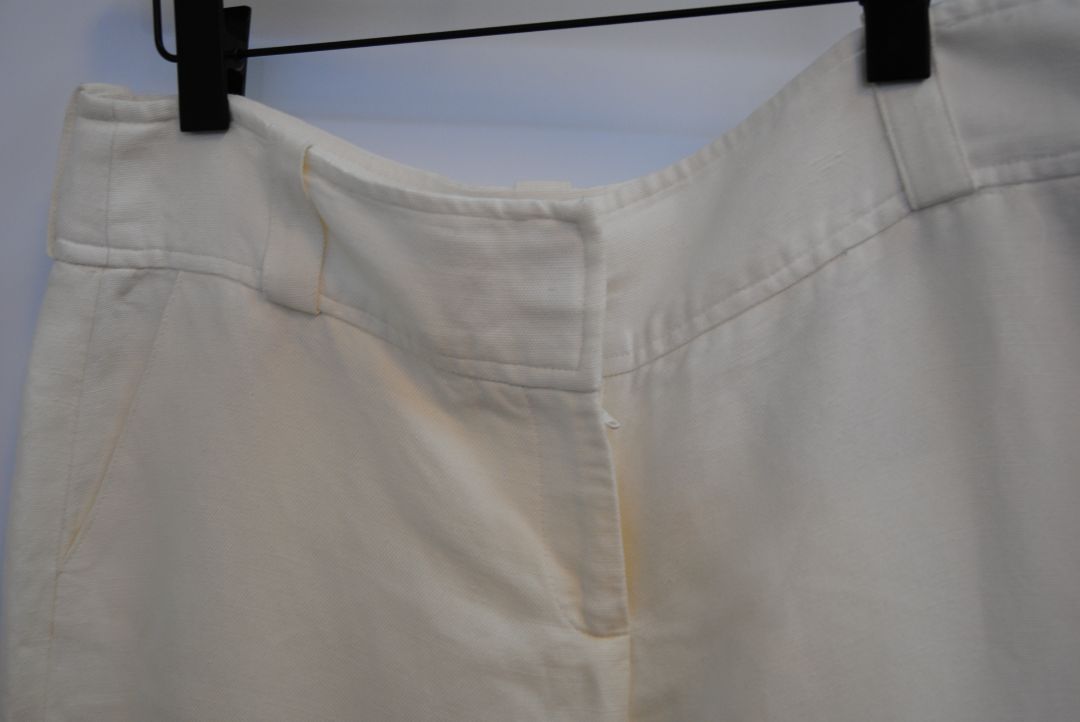 ivory Burberry linen trousers, Waist: 15 in (flat) Rise: 11 in Inseam: 30 in Hip: 19 in (flat) Leg Opening: 9.5 in Length: 41 in Closure: Hidden hook-and-zip front Fit: Mid-to-high rise, relaxed wide-leg silhouette