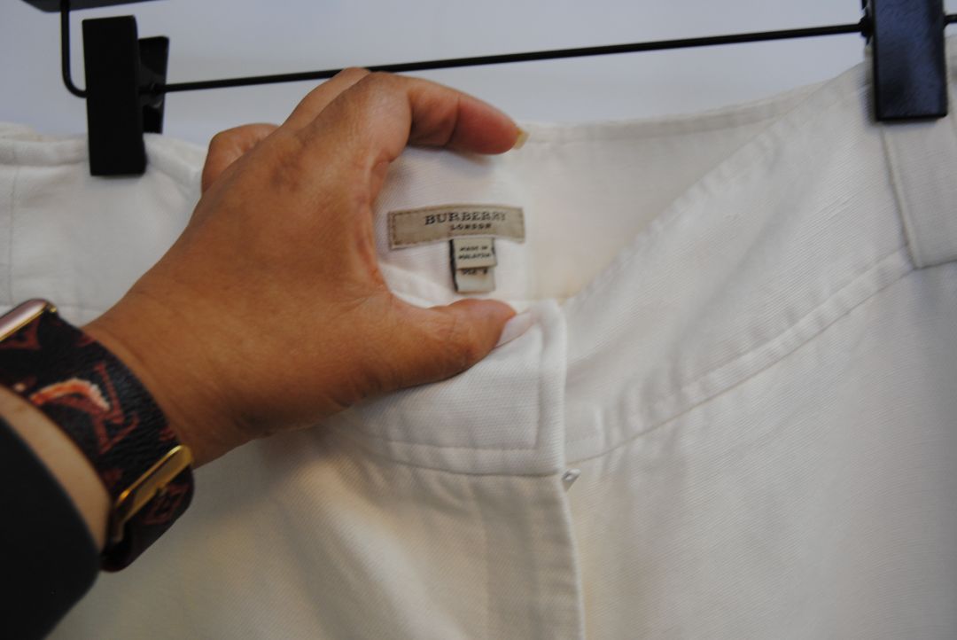 ivory Burberry linen trousers, Waist: 15 in (flat) Rise: 11 in Inseam: 30 in Hip: 19 in (flat) Leg Opening: 9.5 in Length: 41 in Closure: Hidden hook-and-zip front Fit: Mid-to-high rise, relaxed wide-leg silhouette