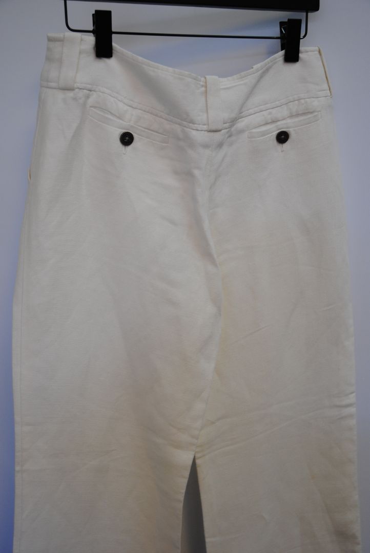 ivory Burberry linen trousers, Waist: 15 in (flat) Rise: 11 in Inseam: 30 in Hip: 19 in (flat) Leg Opening: 9.5 in Length: 41 in Closure: Hidden hook-and-zip front Fit: Mid-to-high rise, relaxed wide-leg silhouette