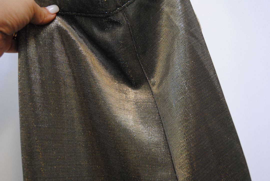 bronze Jean Paul Gaultier metallic trousers, Waist (flat, unstretched): 13.5 in Rise: 10.5 in Inseam: 29 in Hip: 18 in Leg Opening: 6 in Fit: Slim with light taper; stretch pull-on style