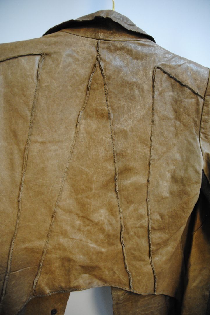 brown Helmut Lang blazer leather, Shoulder to Shoulder: 16 in Bust: 38 in Sleeve Length: 24 in Length (Front): 22 in (asymmetrical hem) Length (Back): 20 in Fit: Structured yet slightly relaxed