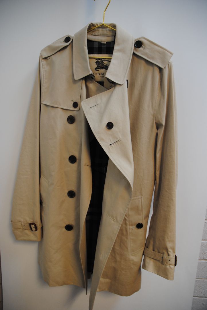 beige and cream Burberry London trench coat, Shoulder to Shoulder: 16.5 in Bust: 39–40 in Sleeve Length: 24.5 in Waist: 38 in Length: 36–37 in (mid-thigh to above knee) Fit: Tailored classic fit