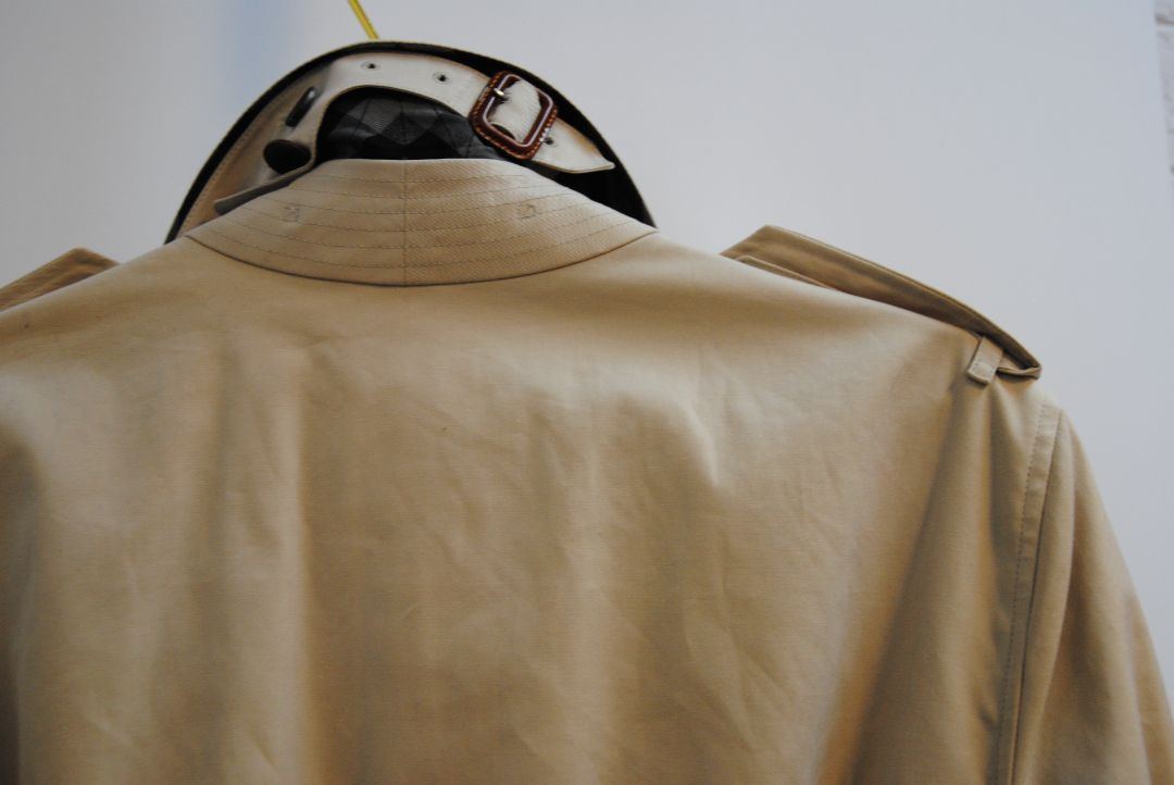 beige and cream Burberry London trench coat, Shoulder to Shoulder: 16.5 in Bust: 39–40 in Sleeve Length: 24.5 in Waist: 38 in Length: 36–37 in (mid-thigh to above knee) Fit: Tailored classic fit