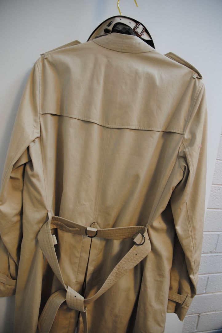 beige and cream Burberry London trench coat, Shoulder to Shoulder: 16.5 in Bust: 39–40 in Sleeve Length: 24.5 in Waist: 38 in Length: 36–37 in (mid-thigh to above knee) Fit: Tailored classic fit