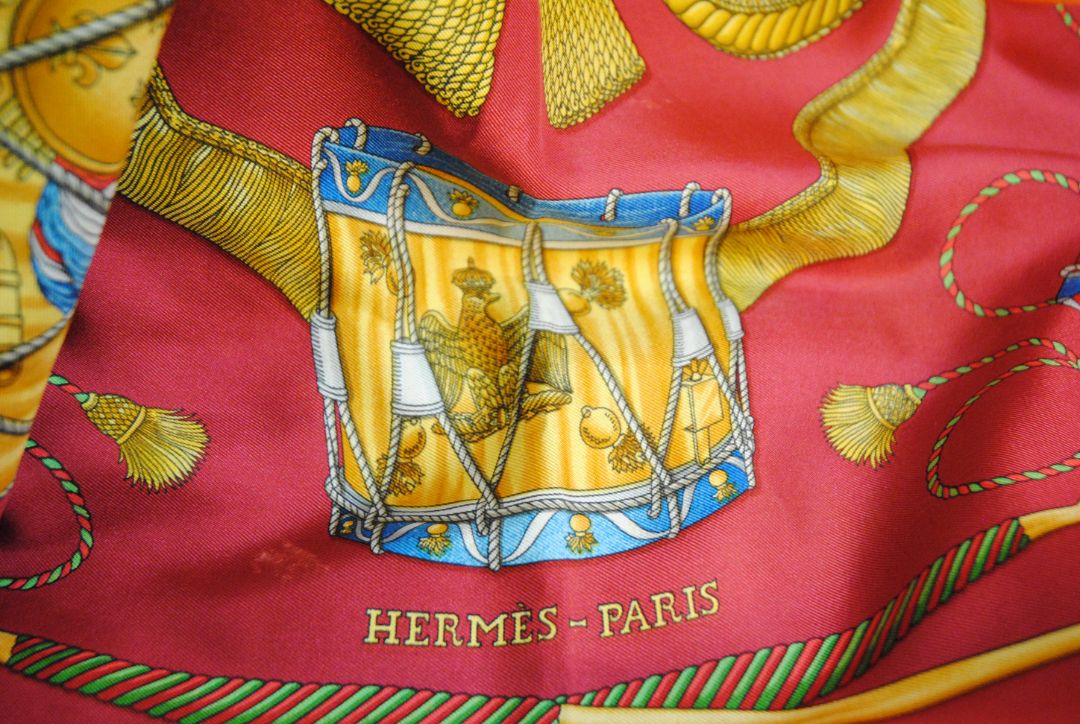 red and gold Hermes “Sous l’Égide de Mars” Silk Scarf (Vintage Red & Gold), Size: 90 cm x 90 cm (35.4” x 35.4”)