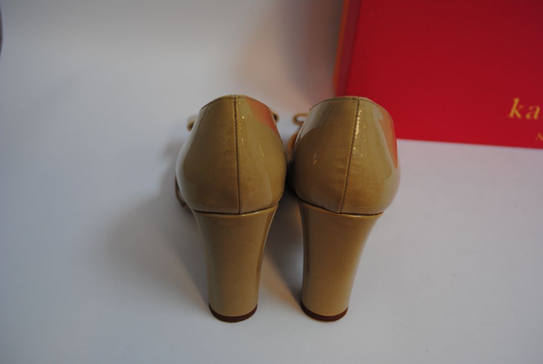 beige Kate Spade leather bow pumps, 6.5