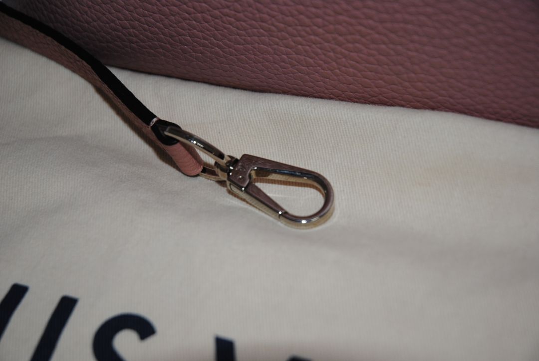 Magnolia Pink Louis Vuitton Capucines BB β Magnolia Pink Taurillon Leather with Silver Hardware, Length: 10.6 in (27 cm) Height: 7 in (18 cm) Depth: 3.5 in (9 cm) Top Handle Drop: 3.5 in (9 cm) Strap Drop: 18β21 in (adjustable/removable)