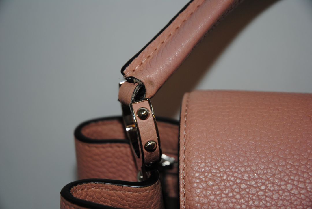 Magnolia Pink Louis Vuitton Capucines BB β Magnolia Pink Taurillon Leather with Silver Hardware, Length: 10.6 in (27 cm) Height: 7 in (18 cm) Depth: 3.5 in (9 cm) Top Handle Drop: 3.5 in (9 cm) Strap Drop: 18β21 in (adjustable/removable)