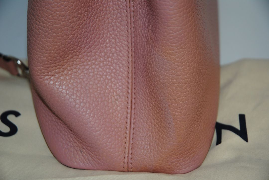 Magnolia Pink Louis Vuitton Capucines BB β Magnolia Pink Taurillon Leather with Silver Hardware, Length: 10.6 in (27 cm) Height: 7 in (18 cm) Depth: 3.5 in (9 cm) Top Handle Drop: 3.5 in (9 cm) Strap Drop: 18β21 in (adjustable/removable)