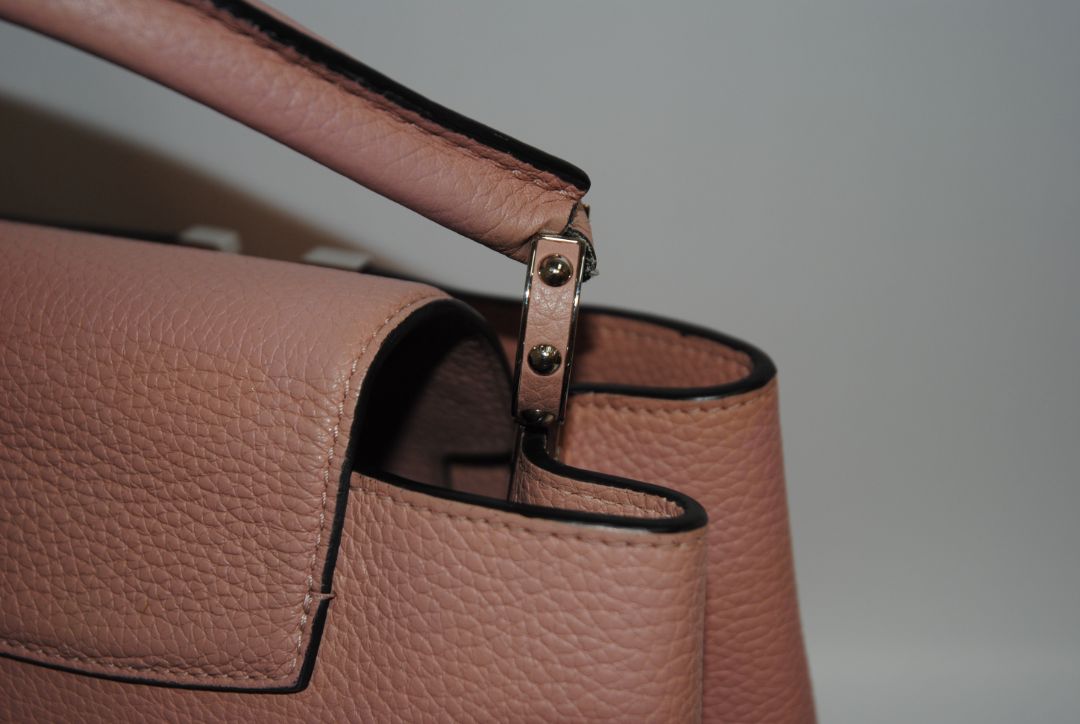 Magnolia Pink Louis Vuitton Capucines BB β Magnolia Pink Taurillon Leather with Silver Hardware, Length: 10.6 in (27 cm) Height: 7 in (18 cm) Depth: 3.5 in (9 cm) Top Handle Drop: 3.5 in (9 cm) Strap Drop: 18β21 in (adjustable/removable)