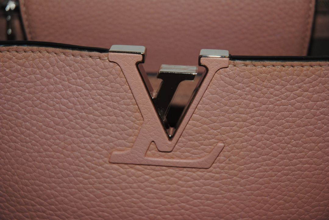Magnolia Pink Louis Vuitton Capucines BB β Magnolia Pink Taurillon Leather with Silver Hardware, Length: 10.6 in (27 cm) Height: 7 in (18 cm) Depth: 3.5 in (9 cm) Top Handle Drop: 3.5 in (9 cm) Strap Drop: 18β21 in (adjustable/removable)