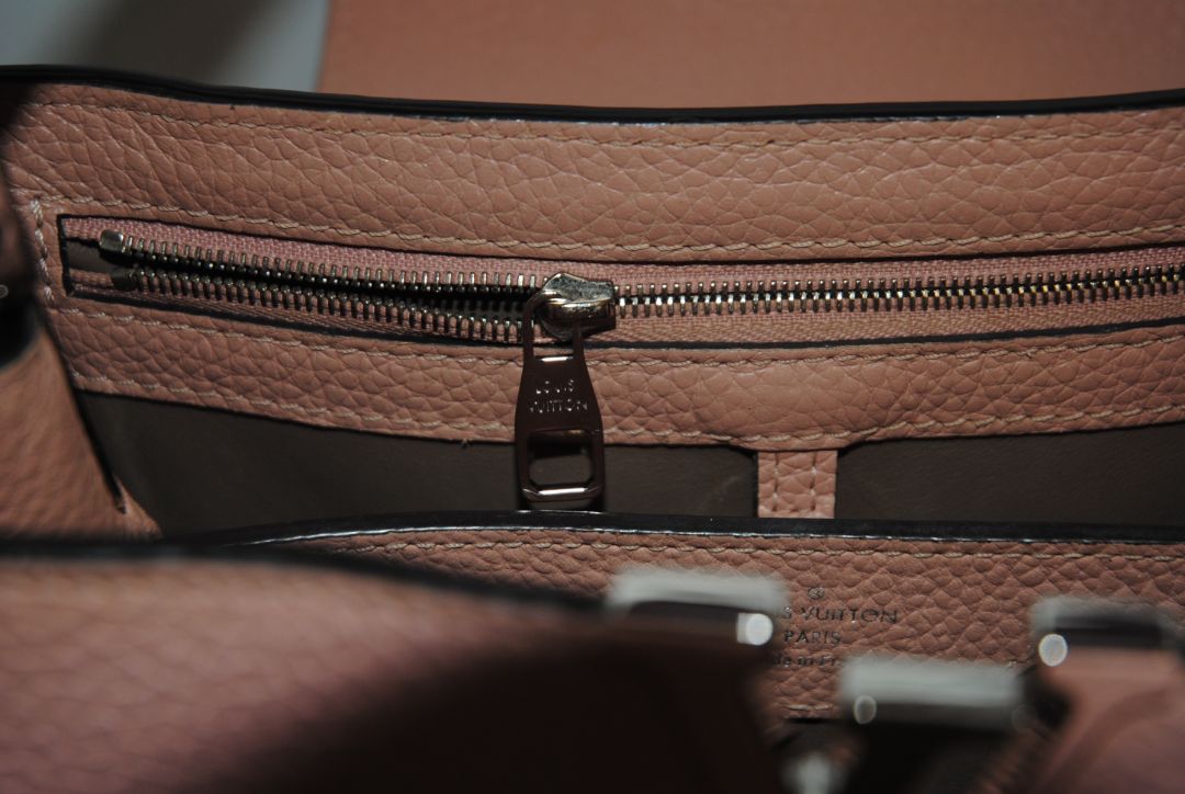 Magnolia Pink Louis Vuitton Capucines BB β Magnolia Pink Taurillon Leather with Silver Hardware, Length: 10.6 in (27 cm) Height: 7 in (18 cm) Depth: 3.5 in (9 cm) Top Handle Drop: 3.5 in (9 cm) Strap Drop: 18β21 in (adjustable/removable)