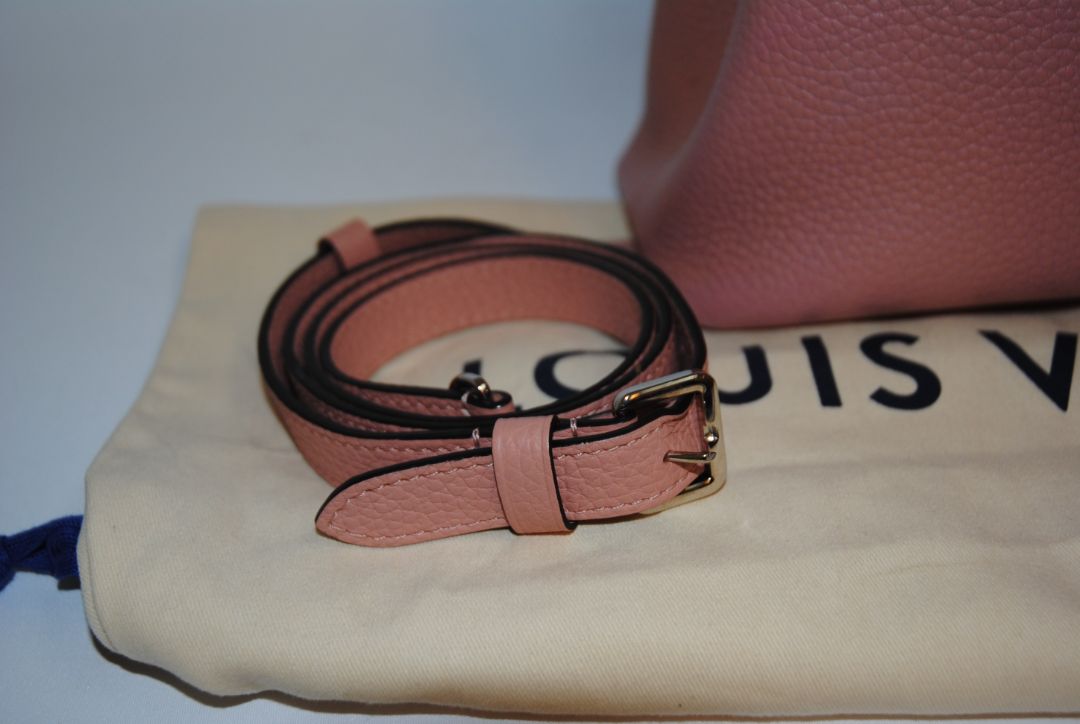Magnolia Pink Louis Vuitton Capucines BB β Magnolia Pink Taurillon Leather with Silver Hardware, Length: 10.6 in (27 cm) Height: 7 in (18 cm) Depth: 3.5 in (9 cm) Top Handle Drop: 3.5 in (9 cm) Strap Drop: 18β21 in (adjustable/removable)