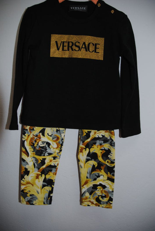 black and gold Versace logo and bottom Barouque, 24 mos