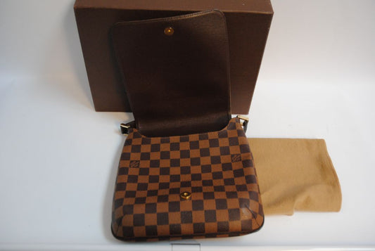damier pattern Louis Vuitton damier bag, Length: 11 in (28 cm) Height: 10 in (25 cm) Depth: 3 in (8 cm) Strap Drop: Adjustable 15 – 22 in (38 – 55 cm)