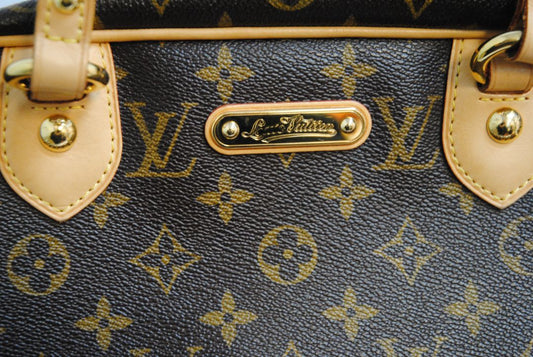 monogram canvas Louis Vuitton Tivoli PM monogram canvas satchel, Length: 14.2 in (36 cm) at widest point Height: 8.3 in (21 cm) Depth: 6.7 in (17 cm) Handle Drop: 6 in (15 cm)