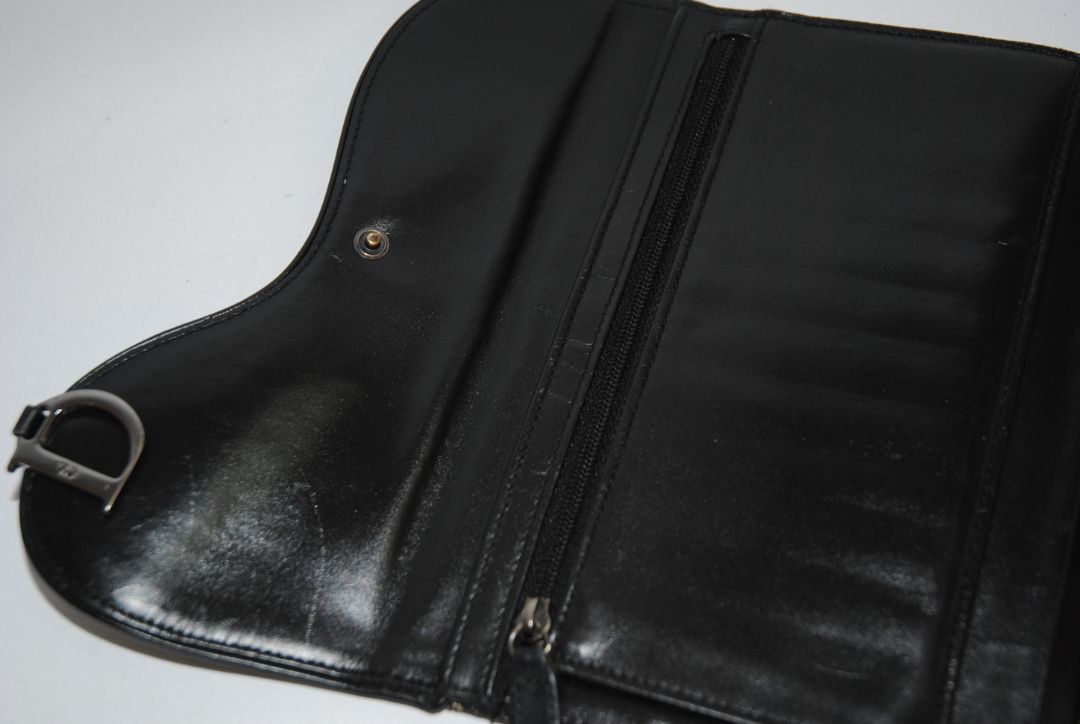black and grey Christian Dior OBLIQUE TROTTER LONG WALLET, Dimensions: Approx. 7.5” L × 4.25” H × 1” D