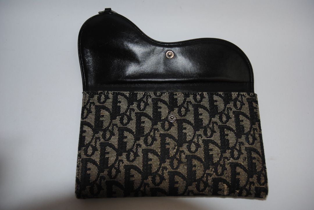 black and grey Christian Dior OBLIQUE TROTTER LONG WALLET, Dimensions: Approx. 7.5” L × 4.25” H × 1” D