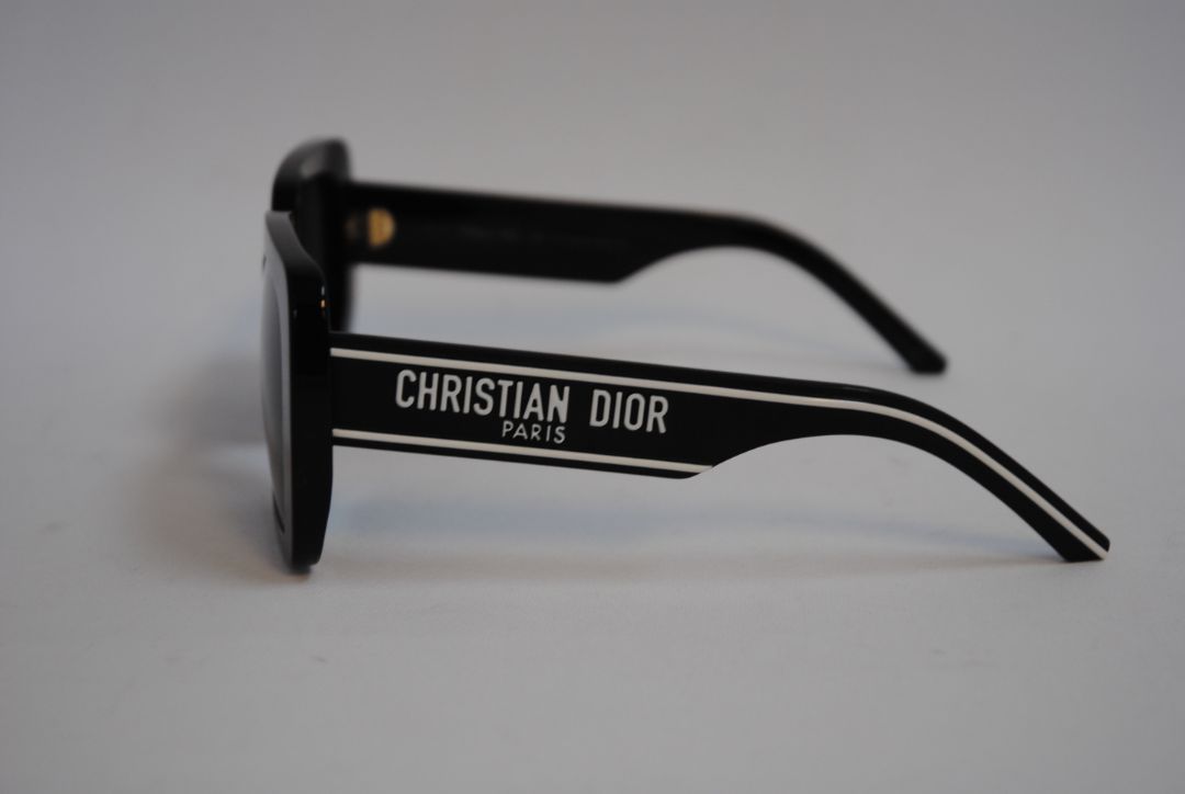 black and white Christian Dior Oversized Square Sunglasses, Manufacturer sizing: ~58–18–145 mm Dimensions (approximate, per Dior standards): Lens Width: ~58 mm Bridge: ~18 mm Temple Length: ~145 mm