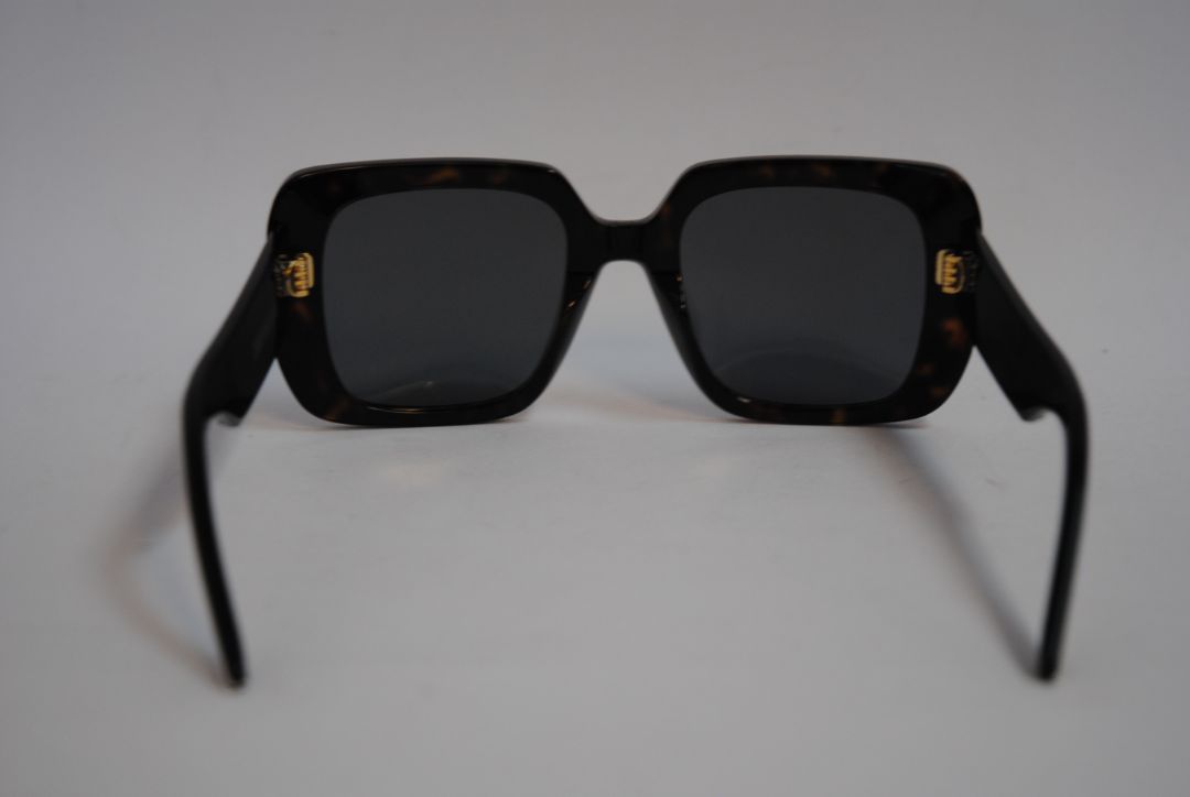 black and white Christian Dior Oversized Square Sunglasses, Manufacturer sizing: ~58–18–145 mm Dimensions (approximate, per Dior standards): Lens Width: ~58 mm Bridge: ~18 mm Temple Length: ~145 mm