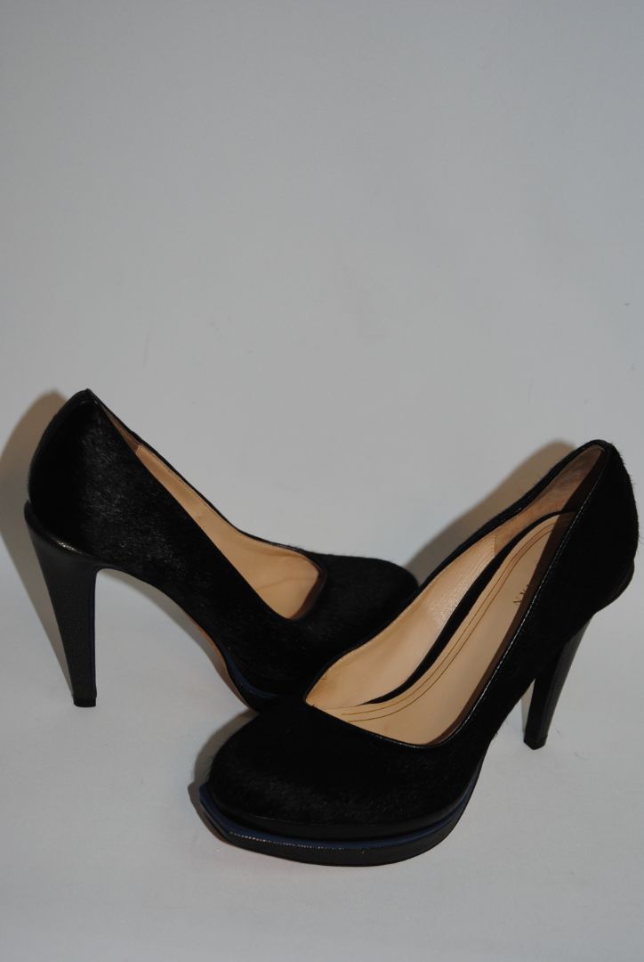 black Cole Haan haircalf leather pumps, Heel: ~4 in (10.2 cm) Platform: ~0.75 in (1.9 cm