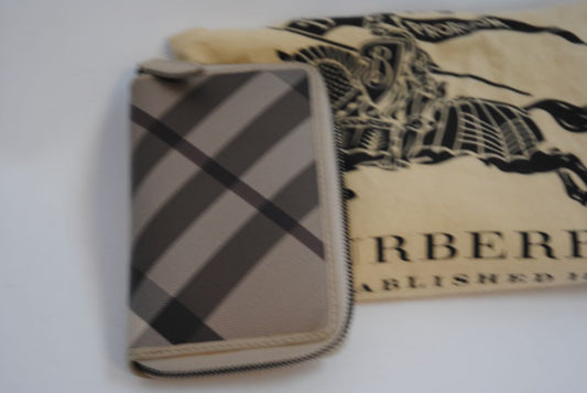 taupe/tan Burberry Zip-Around 12 card Wallet / Card Holder, Length: 4.5 in (11.4 cm) Height: 2.75 in (7 cm) Depth: 0.75 in (2 cm)