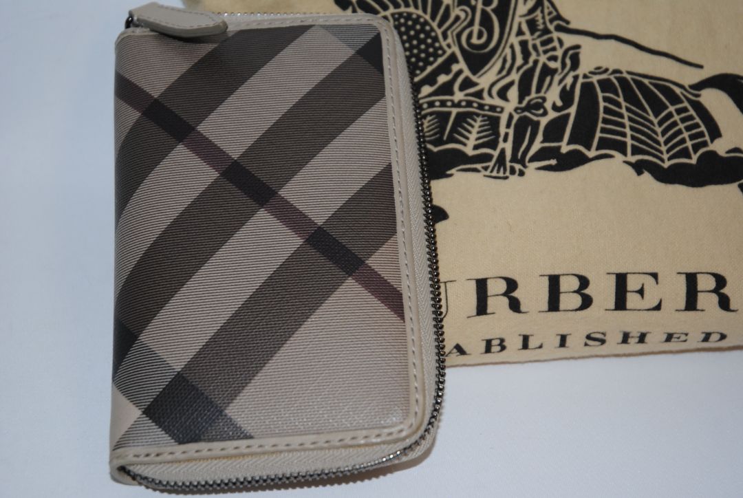 taupe/tan Burberry Zip-Around 12 card Wallet / Card Holder, Length: 4.5 in (11.4 cm) Height: 2.75 in (7 cm) Depth: 0.75 in (2 cm)