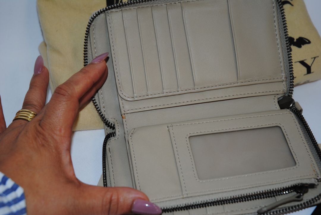 taupe/tan Burberry Zip-Around 12 card Wallet / Card Holder, Length: 4.5 in (11.4 cm) Height: 2.75 in (7 cm) Depth: 0.75 in (2 cm)