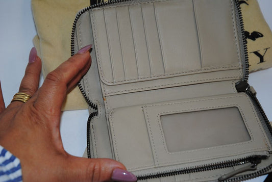 taupe/tan Burberry Zip-Around 12 card Wallet / Card Holder, Length: 4.5 in (11.4 cm) Height: 2.75 in (7 cm) Depth: 0.75 in (2 cm)