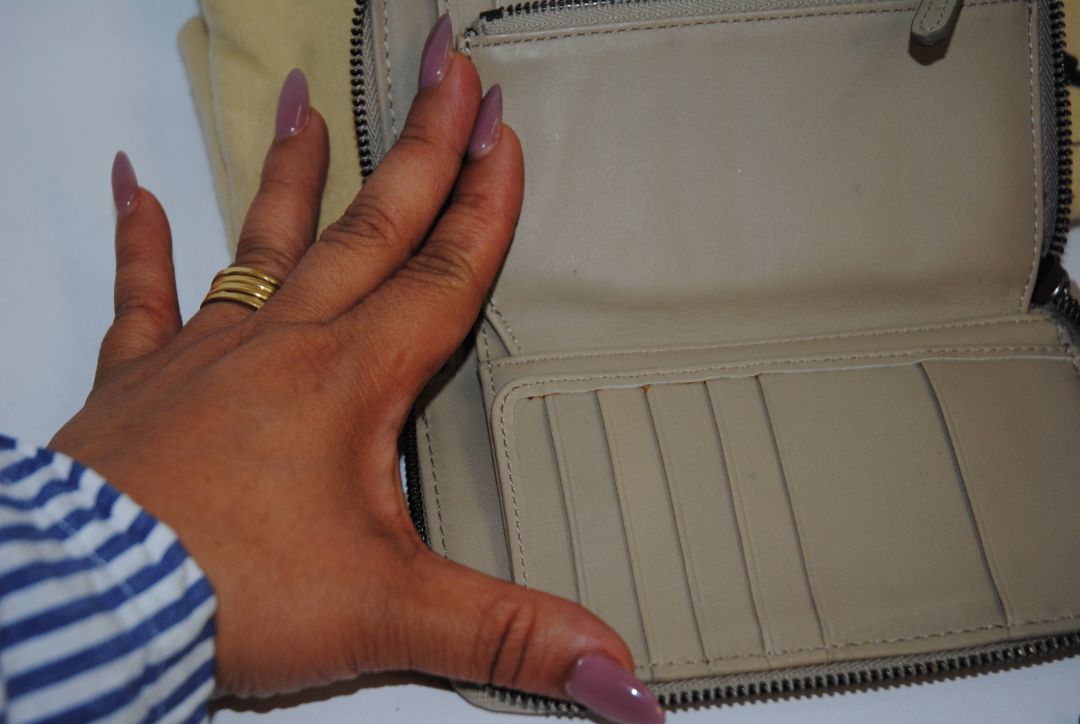 taupe/tan Burberry Zip-Around 12 card Wallet / Card Holder, Length: 4.5 in (11.4 cm) Height: 2.75 in (7 cm) Depth: 0.75 in (2 cm)