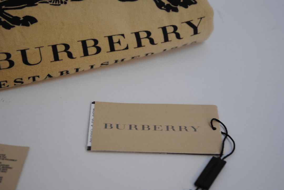 taupe/tan Burberry Zip-Around 12 card Wallet / Card Holder, Length: 4.5 in (11.4 cm) Height: 2.75 in (7 cm) Depth: 0.75 in (2 cm)