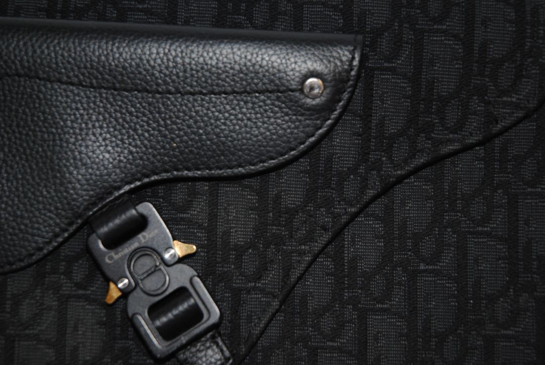 black Christian Dior Jacquard Saddle Bag with Leather Trim & Buckle Clasp, Approx. 9.5” W × 6.5” H × 2.5” D