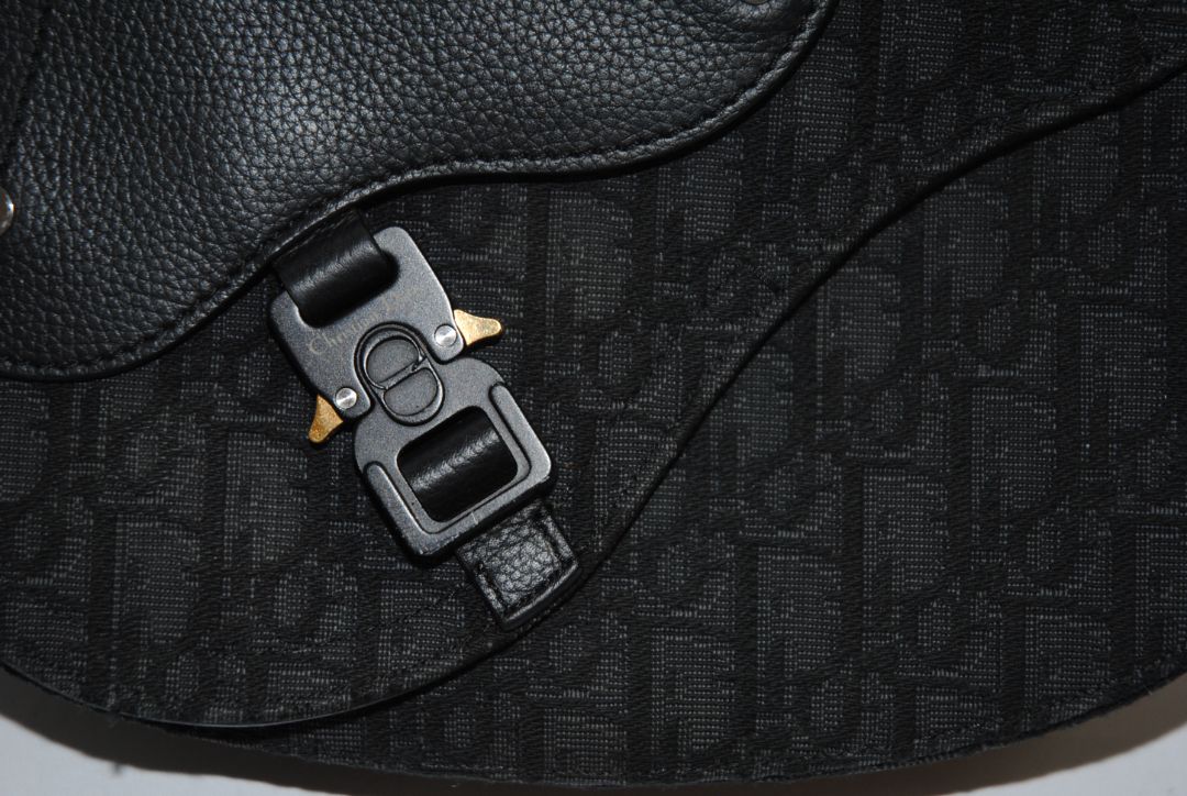 black Christian Dior Jacquard Saddle Bag with Leather Trim & Buckle Clasp, Approx. 9.5” W × 6.5” H × 2.5” D