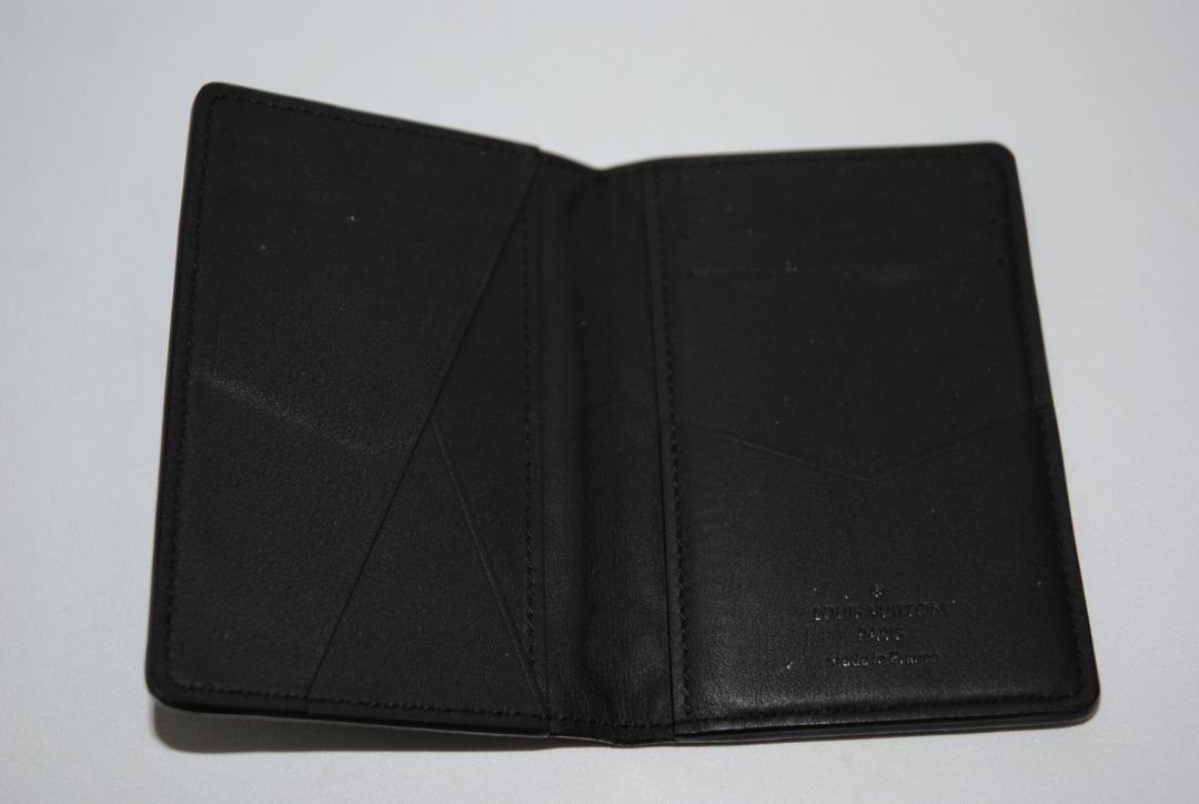 black Louis Vuitton Pocket Organizer, Width: 2.8 in (7.2 cm) Height: 4.3 in (11 cm) Depth: 0.4 in (1 cm) Fit: Compact – fits easily in any pocket or micro bag