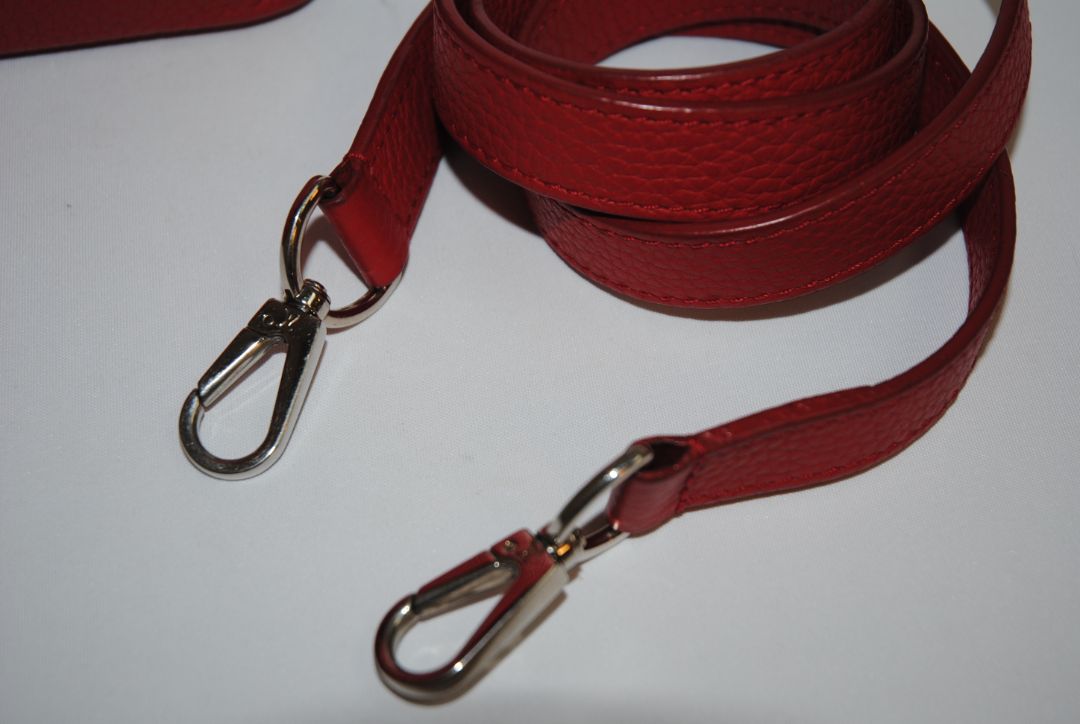 red taurillion leather Louis Vuitton Capucines Nano, measures 6.4 × 4.3 × 2.6 inches (16.3 × 10.9 × 6.6 cm).